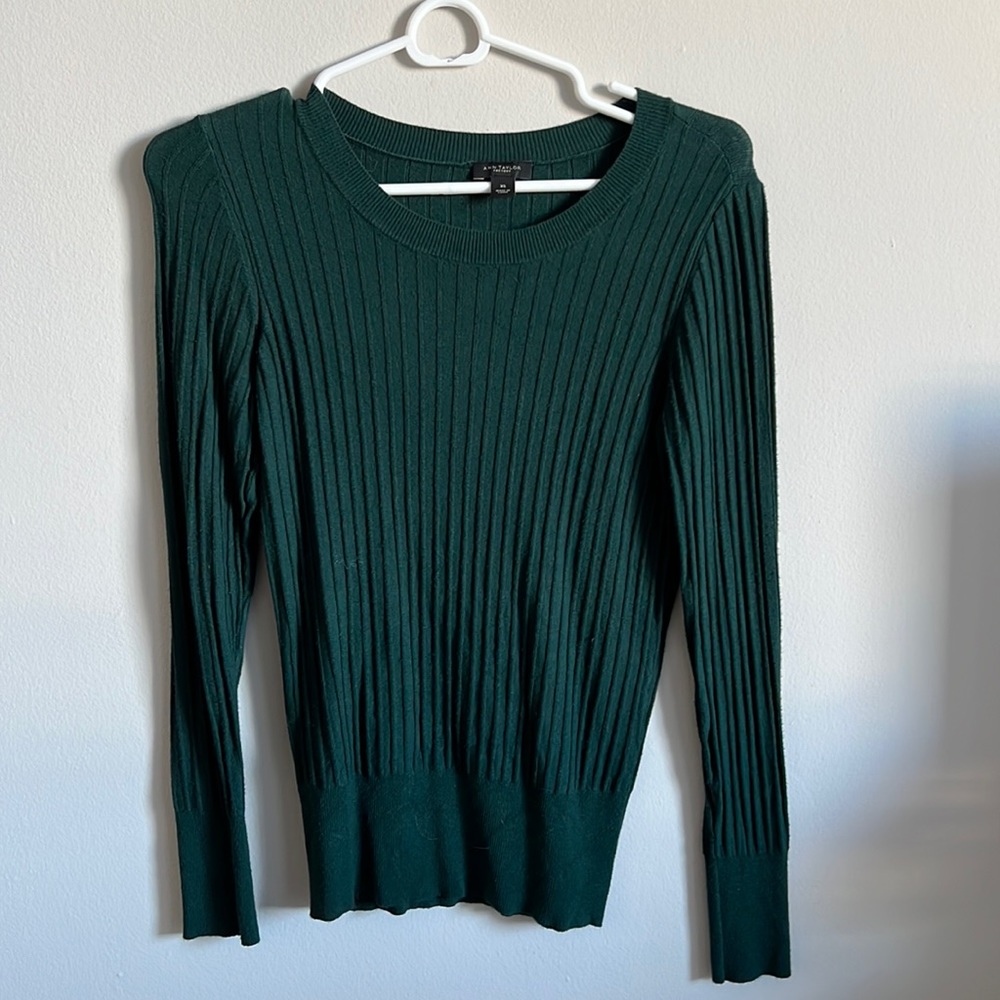 Tight dark green sweater